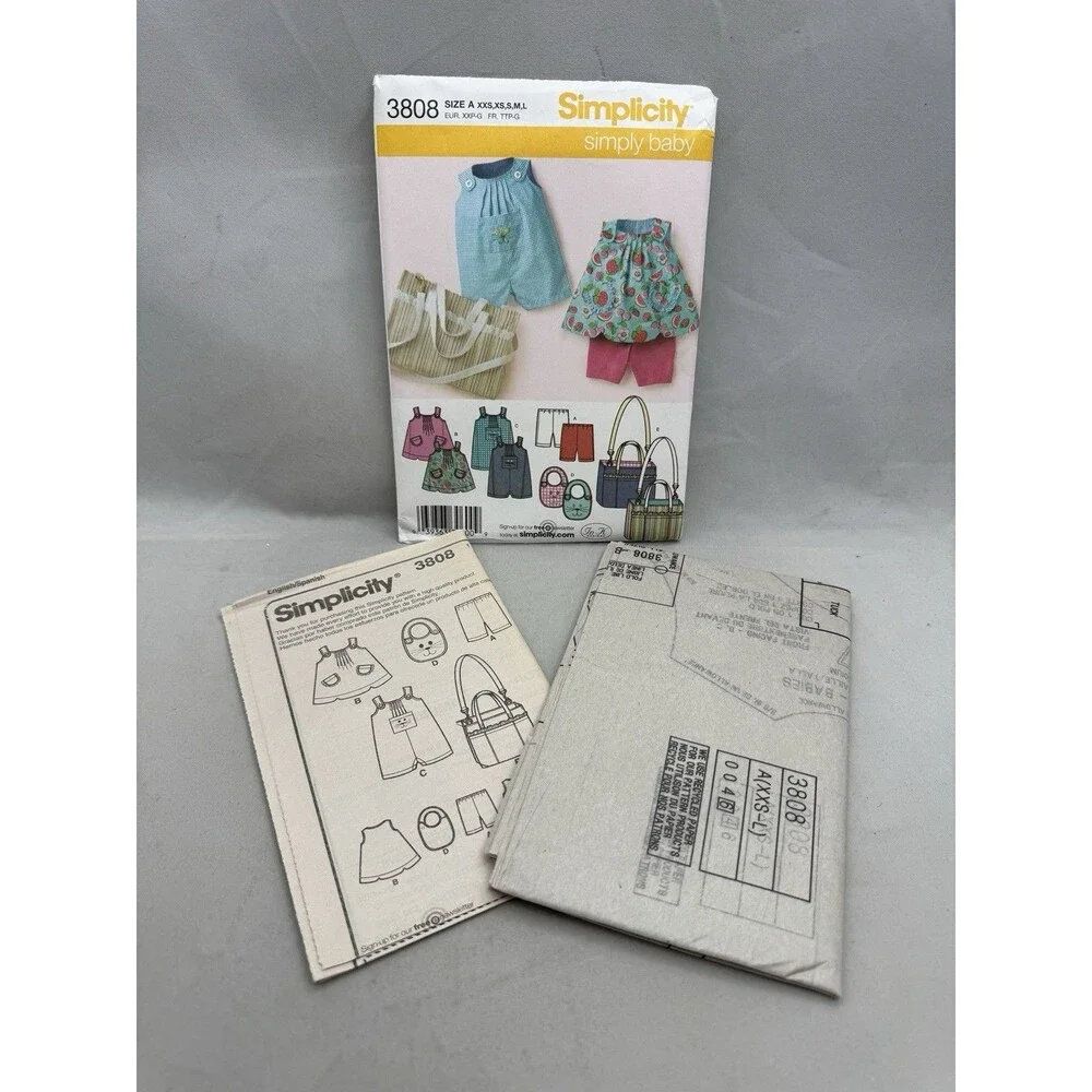 Simplicity 3808 Sewing Pattern Simply Baby Top Romper Bib Diaper Bag Shorts